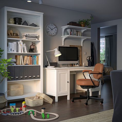 HEMNES/ALEFJÄLL Desk and storage combination, and swivel chair/white stain golden brown. Make sure you have a great day at work – at home. This complete, functional set has all you need. HEMNES desk with drawers and cable management, ALEFJÄLL chair with ergonomic features and spacious storage. Top panel/ Drawer front/ Wooden part: Solid pine. Ikea Hemnes Bookcase, Hemnes Bookcase, Neat Desk, Ikea Hemnes, White Bookcase, White Stain, Home Office Setup, Ergonomic Office Chair, Swivel Chair