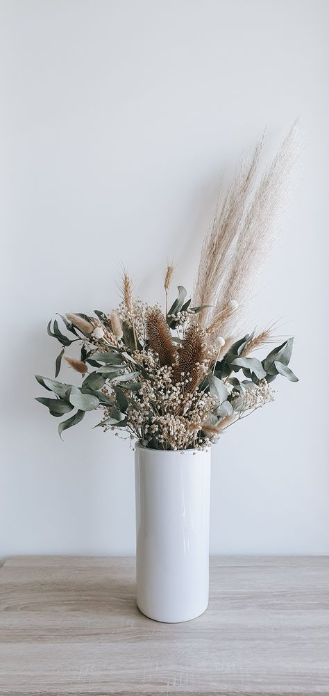 A beautiful statement piece and inspiration for your home or room decoration! Has a gorgeous natural look with dried eucalyptus leaves and baby breaths Dried Flowers With Eucalyptus, Eucalyptus And Pampas Vase, Dried Flowers Eucalyptus, Dried Botanicals Decor, Dried Eucalyptus Centerpiece, Dry Eucalyptus Decor, Eucalyptus Dried Floral Arrangements, Styling Dried Flowers, Eucalyptus Decor Vase