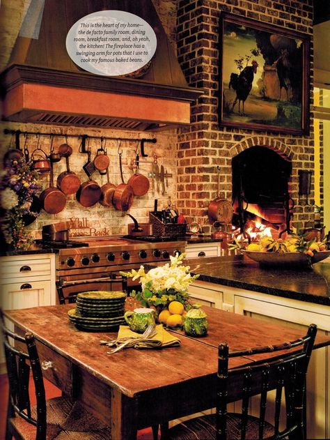 Paula Deen Kitchen, Fireplaces In Kitchens, Savannah Style Homes, Brick Fireplace In Kitchen, Hanging Copper Pots In Kitchen, Kitchens With Fireplaces, Fireplace In Kitchen, Fireplace In The Kitchen, Cozy Country Kitchen