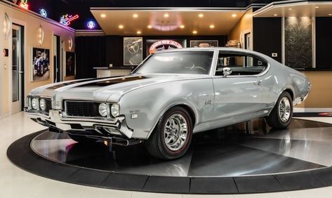 1969 Oldsmobile 442 VIN: 344879M416034 Check out this beautifully done 1969 Oldsmobile 442. This 442 is finished in Platinum Silver Metallic over Ebony... 1969 Oldsmobile 442, Hurst Oldsmobile, Oldsmobile 442, Dream Car, Street Scenes, Hot Cars, Supercars, Luxury Cars, Dream Cars