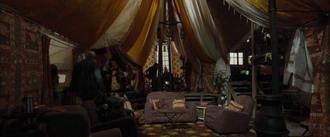 Charmed Tent | Harry Potter Wiki ... Harry Potter Goblet, Harry Potter Wiki, Fantasy Party, Slytherin And Hufflepuff, Glamping Resorts, The Burrow, The Goblet Of Fire, Harry Potter Scene, Goblet Of Fire