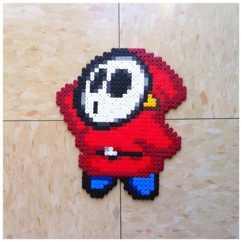 Shy Guy Bead Sprite by Night-TAG.deviantart.com on @deviantART Perler Bead Mario, Perler Creations, Melty Bead Patterns, Perler Ideas, Shy Guy, Perler Crafts, Graph Paper Art, Bead Sprite, Diy Perler Beads