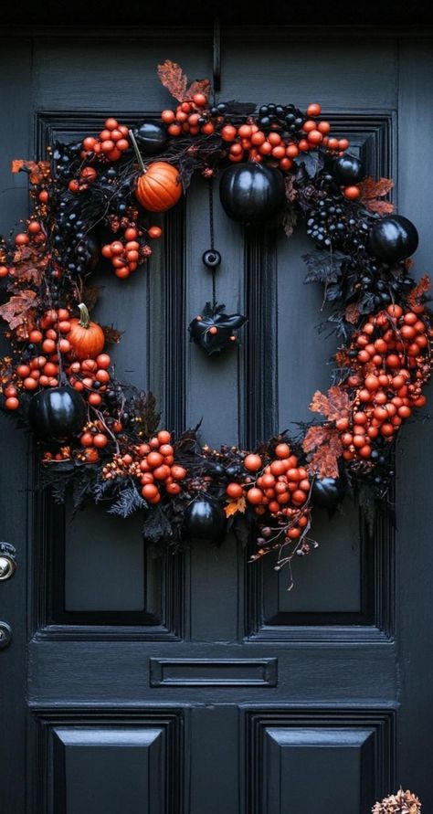 Craft a hauntingly beautiful Halloween wreath that combines elegance with eerie charm. Start with a black wreath form, covering it with deep purple and silver mesh. Add clusters of mercury glass pumpkins, glittery skull ornaments, and vintage-inspired black roses. Incorporate strands of pearls and crystal droplets for a touch of glamour. Finish with a dramatic black and silver bow. This sophisticated Halloween wreath idea offers a luxurious take on seasonal decor, ideal for those who prefer thei Mercury Glass Pumpkins, Halloween Wreath Ideas, Black And White Wreath, Sophisticated Halloween, Skull Ornaments, Deco Halloween, Black Wreath, Beautiful Halloween, Wreath Form