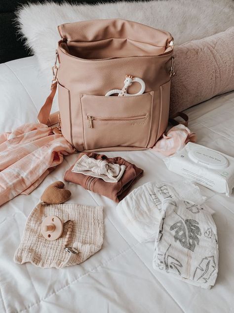 Inspired By This - Lifestyle site sharing Weddings, Baby products, Home design, Parties, Honeymoon travel and more Whats In My Diaper Bag, Diper Bags, Cute Diaper Bags, Hospital Bag Essentials, Diaper Bag Essentials, Best Diaper Bag, Nursery Bag, Stroller Hooks, Designer Diaper Bag