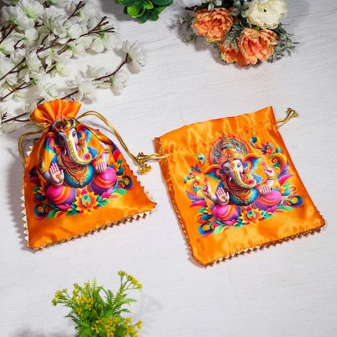 Elevate your festivities with our beautifully crafted Ganesha Potlis. These beautiful bags with Lord Ganesh’s image are an epitome of rich Indian culture and artistry. They are perfect for gifting sweets, dry fruits, or as home decor. Available in four stunning colors. #GaneshPotli #IndianGifts #HomeDecor #FestivalDecor Colorful Vibes, Indian Wedding Favors, Lotus Print, Indian Gifts, Sweets Gift, Return Gifts, Potli Bags, Dry Fruits, Housewarming Present