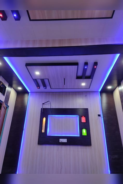 It is a LED TV panel design with a beautiful ceiling. Pvc Full Room Design, Luxury Bedroom Pop Design, Tv Panel Design For Bedroom, Led Tv Panel Design, Dargha Image, Tv Panel Design, Led Tv Panel, Pvc Wall Panels Designs, Lcd Panel Design