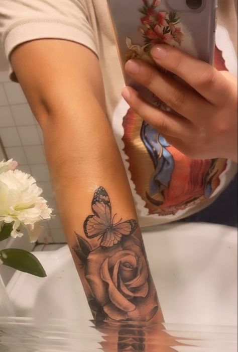 got this beautiful piece done on my forearm paired with a butterfly Butterfly Forearm Tattoo Women, Forearm Tats For Women, Butterfly Tattoo Forearm, Butterfly Forearm Tattoo, Baddie Tattoos, 2024 Tattoo, Rose Tattoo Forearm, Butterfly Hand Tattoo, Inner Forearm Tattoo