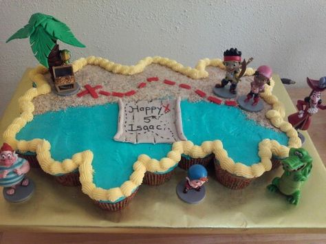 Jake, the Pirate, pull apart cupcake cake. Pirate Cupcake Cake, Pirate Pull Apart Cupcake Cake, Jake The Pirate, Pirate Cakes, Pull Apart Cupcake, Pirate Ship Cakes, Pirate Cupcake, Pull Apart Cupcake Cake, Shaped Cakes