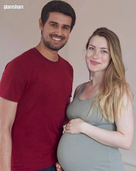 On July 9, 2024, YouTuber Dhruv and his wife Juli shared a post on Instagram announcing that she is pregnant. In the first photo, Juli wore a teal bodycon dress and looked radiant as she cradled her baby bump. Dhruv shared the happy news with excitement. #glamsham #dhruv #dhruvrathee #pregnancy #india #indianyoutuber [ Dhruv Rathee, Pregnancy, YouTube, Youtuber, India ] Dhruv Rathee, Pregnancy Congratulations, Happy News, Expecting Parents, Family Goals, Baby Bump, Baby Bumps, Exciting News, New Chapter