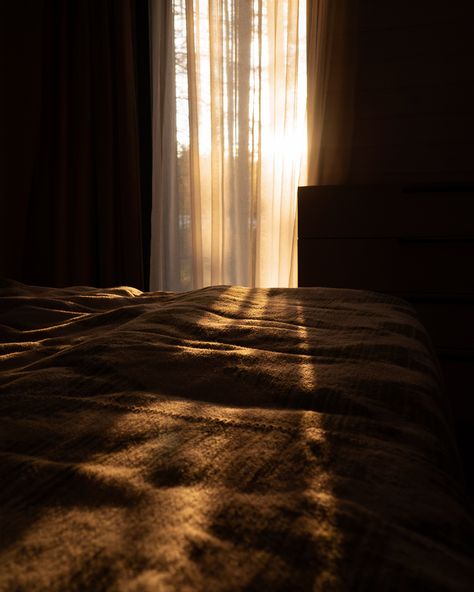 As sunlight gently breaches the curtains, it blankets the bed in a warm, inviting glow. Outside the window, a breathtaking sunset over a lush forest creates a mesmerizing backdrop, making it a perfect image to relax and unwind with. Bedroom Sunlight, Rendered Houses, Bedroom Photography, Outside The Window, Lush Forest, Curtain Backdrops, View Wallpaper, Bed Bedroom, Window Bed