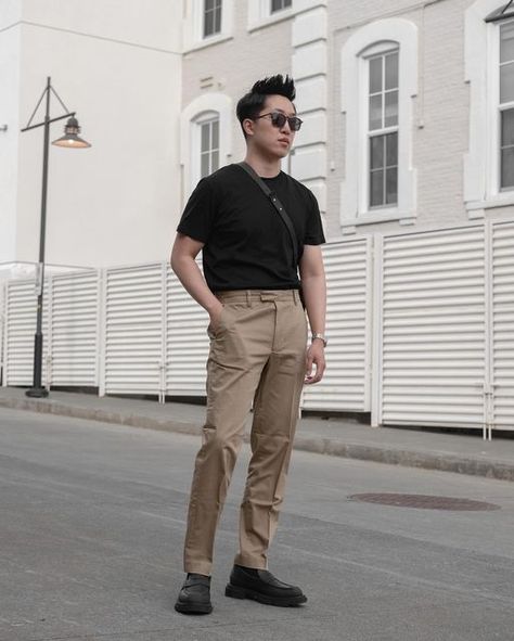 Val on Instagram: "Weekend errands look - Black and camel combination. __ The warm weather was calling for a simple t-shirt and chino look when I was out picking up dinner yesterday. To elevate this simple outfit, I paired it with a slim messenger crossbody and a pair of platform loafers. __ #springstyles #minimalstreetstyle #menstyledaily #acnestudios #platformshoes #elevatedstyle" Black And Khaki Outfit Men, Black Shirt Khaki Pants Outfit Men, Black And Khaki Outfit, Khaki Outfit Men, Tan Pants Men, Khaki Pants Outfit Men, Colored Pants Outfits, Black Shirt Outfits, Brown Pants Outfit