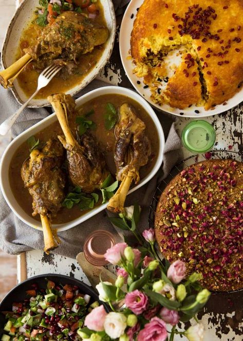 A table filled with Persian dinner recipes for Persian Feast week Persian Lamb Shank Recipe, Persian Dinner, Food Persian, Persian Food Iranian Cuisine, Arabisk Mad, Lamb Shank Recipe, Food Garnish, Iran Food, Iranian Recipes