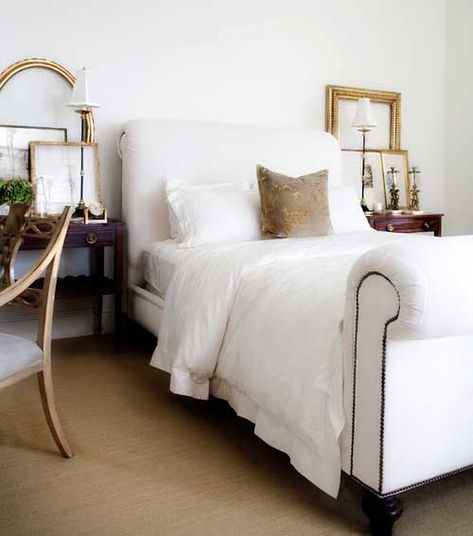 Not all wall decor has to hang on the wall. Sometimes, the best look is to lean art and other objects to create a casual look! Here's how to do it right. Quilted Bed Frame, White Sleigh Bed, Tan Bedroom, Tufted Bed Frame, Upholstered Sleigh Bed, Bedroom Theme, Neoclassical Design, Bedroom Orange, Bedrooms Decor