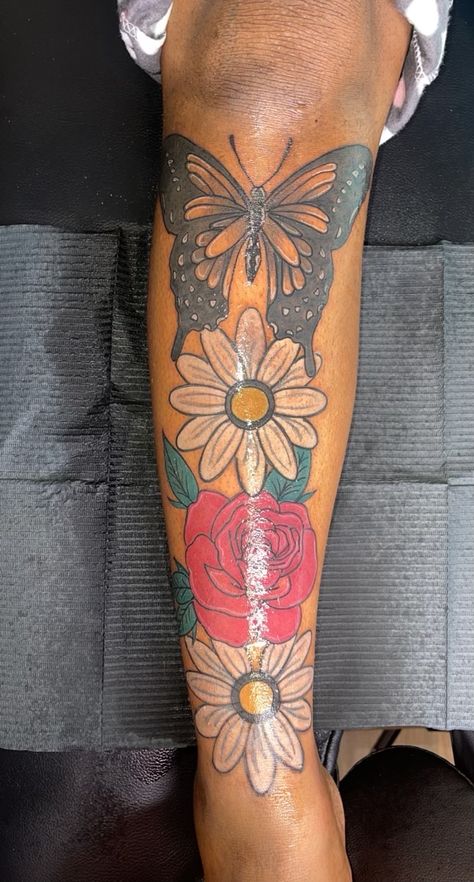 Butterfly leg tattoo with flowers Front Calf Tattoos For Women, Butterfly Leg Tattoo, Butterfly Leg Tattoos, Calf Tattoos For Women, Flower Leg Tattoos, Upper Leg Tattoos, Calf Tattoo Men, Tattoo With Flowers, Shin Tattoo