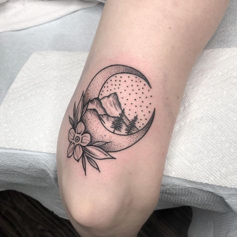 Moon Tattoos: Mountain Moon. A mountain moon tattoo created with a mix of line and dot work. Click through for 53 moon tattoo ideas. #moontattoo #tattoos #tattooideas #mountaintattoo IG: @hayley.tattoo.art Crescent Moon Tattoo Ideas, Crescent Moon Tattoos, Moon Tattoo Ideas, Shoulder Cap Tattoo, Full Moon Tattoo, Tattoo Moon, Moon Mountain, Moon Tattoos, Crescent Moon Tattoo