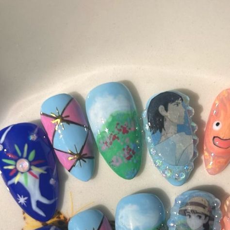 Maeves Trinkets on Instagram: "Howls Moving Castle Nails now available on website. What do you think of the set? 

~~~~~~~~~~~~~~~~~~~~~~~~~~~~~~~~~~~~~~~~~
#howlsmovingcastle #howlpendragon #howlsmovingcastleedit #howlsmovingcastlenails #calcifer #studioghibli #animenails #cute #blue #pressonnails #pressonnailsforsale #nailart" Howls Moving Castle Quinceanera, Calcifer Nail Art, Howls Moving Castle Nail Art, Calcifer Nails, Howls Moving Castle Nails, Castle Nails, Howl Pendragon, Howls Moving, Anime Nails