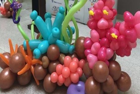 Top 10 Colourful Coral Reef Sculptures Columns Decor, Balloons Art, Coral Sculpture, Cocktail Umbrellas, Time Of The Month, Fishing Party, Ocean Party, Balloon Ideas, Christmas Play