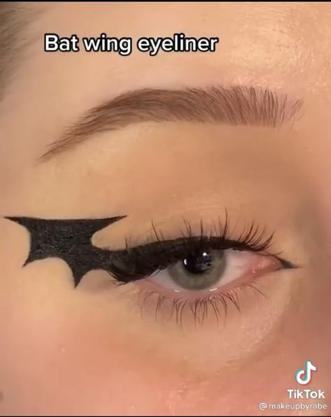 Batman Inspired Makeup, Batman Eyeliner, Batman Eye Makeup, Batman Makeup Ideas, Halloween Graphic Liner, Simple Halloween Makeup Looks For Work, Batwing Eyeliner, Halloween Eyeliner Looks, Bat Wing Eyeliner