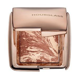 Shop Hourglass’ Ambient Lighting Bronzer Mini at Sephora. Its bronze pigments deliver a sunkissed glow and depth and dimension. Nars Bronzer, Cream Contour Stick, Hourglass Makeup, Travel Size Makeup, Best Bronzer, Travel Size Toiletries, Makeup Gift Sets, Bronze Lighting, Cream Contour