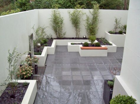 Walled courtyard garden with raised borders and rendered walls Walled Courtyard Garden, Raised Borders, Modern Courtyard, Courtyard Gardens, Garden Walls, Small Courtyard Gardens, Courtyard Gardens Design, Small Courtyards, Patio Garden Design