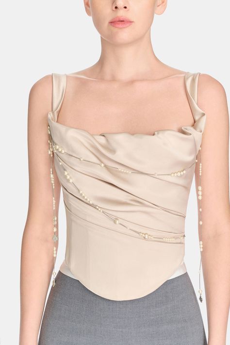 Indulge in the luxurious and elegant charm of the corset, designed for the sophisticated woman. This bodycon top is crafted with premium polyester fabric for a comfortable and flattering fit. Its sleeveless design adds a touch of grace, perfect for any occasion. Front length: 52cmShoulder width: 37cm/38cm/39cm/40cm/41cm- Measurements might differ within 1.5cm allowance. Corset Neckline, Church Tops For Women, Elegant Beige Corset With Corset Back, Elegant Sleeveless Beige Corset, Luxury Cropped Chic Corset, Beige Fitted Chic Corset, Beige Sleeveless Corset With Corset Back, Bodycon Tops, Beige Top