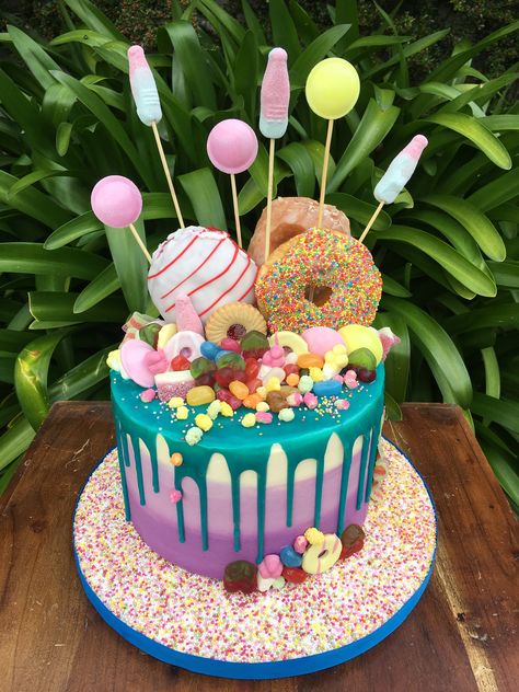 Sweet Covered Birthday Cake, Cake With Donut Decorations, Sweet Drip Cake, Cakes With Donuts On Top, Birthday Cake With Donuts On Top, Cake For 9 Year Girl, Birthday Cakes For 9 Year Girl, Cream Cake Design Birthday, Colourful Cakes Birthday