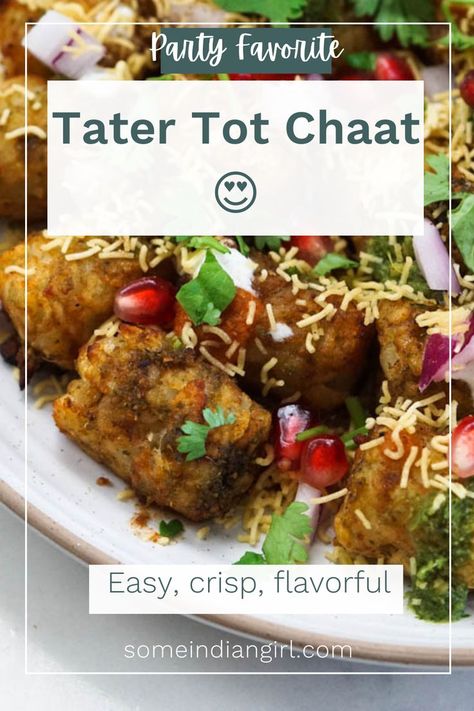 Plate of tater tot chaat with sev, pomegranate and chutneys. Indian Cookies, Samosa Chaat, Indian Veg Recipes, Indian Dinner, Easy Indian Recipes, Curry Recipes Indian, Indian Bread, Paneer Recipes, Indian Breakfast