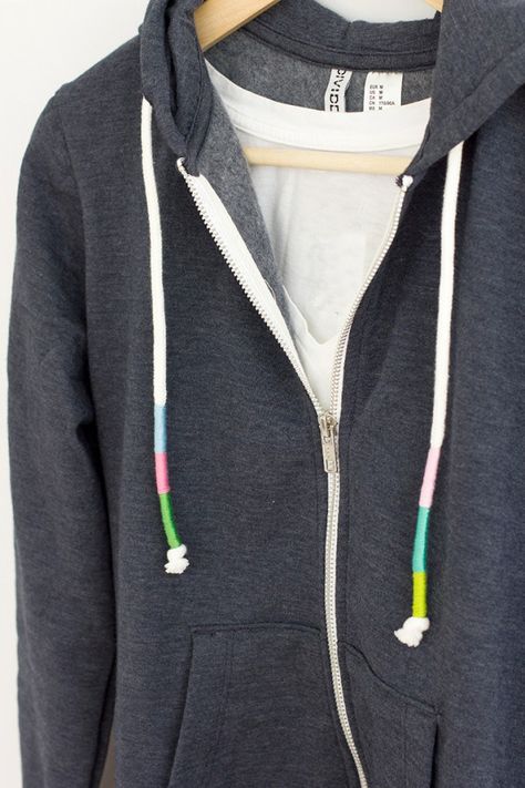 I have embellished my hoodie cords with pom poms on the ends and I have seen beads slid onto the cords but wrapping them? No…..until now! How cool is this? Pop on over to the blog Alice and L… Simple Hoodie, Embellished Hoodie, Lace Hoodie, Hoodie Diy, String Crafts, Diy Wrap, I Cord, Girls Camp, Women Diy