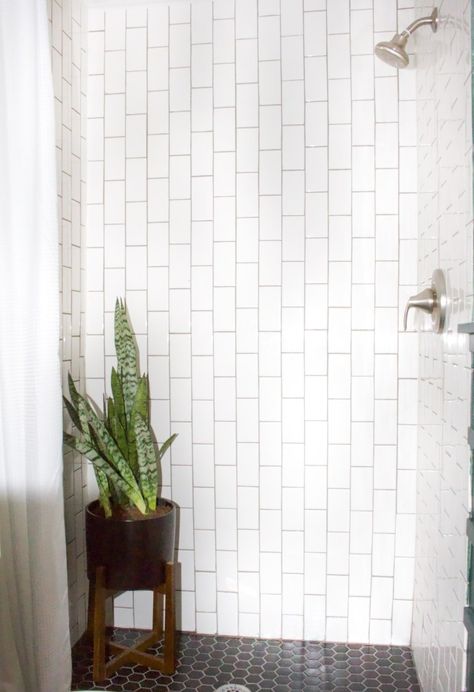 Vertical Subway tile Vertical Subway Tile, Shower Tiling, Blue Shower Tile, Diy Tile Shower, White Subway Tile Bathroom, Black Hexagon Tile, Moody Bathroom, Subway Tiles Bathroom, Eclectic Bathroom