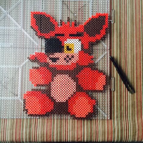 Foxy plushy Perler beads Fnaf Sb Perler Beads, Fnaf Perler Beads Pattern, Fnaf Pearl Beads, Fnaf Vanny Perler Beads, Fnaf Perler Beads, Toy Bonnie Perler Beads, Foxy Perler Bead Pattern, Foxy Perler Beads, Easy Perler Bead Patterns