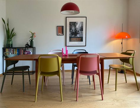 Mixed Color Dining Chairs, Colorful Dinning Room Chairs, Colorful Chairs Dining Room, Wood Table Colored Chairs, Multi Coloured Dining Room Chairs, Dining Table With Different Color Chairs, Eating Room Ideas, Colourful Dining Chairs, Colorful Dining Rooms