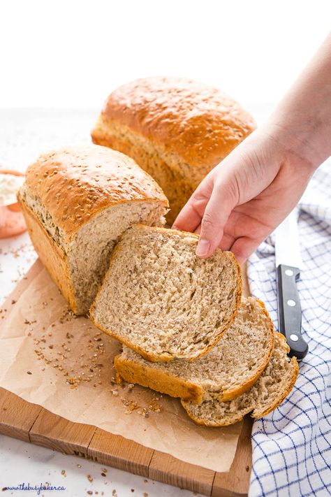 This Easy Whole Grain Sandwich Bread is a rustic-looking sandwich loaf that's perfectly soft and fluffy, full of fibre and whole grain goodness and perfect for school lunches or serving with your favourite soups or stews. Recipe from thebusybaker.ca! #wholegrains #wholegrainbread #healthy #sandwich #schoollunch #homemade #bread Rustic Whole Wheat Bread Recipe, Healthy Sandwich Bread Recipe, Whole Grain Sandwich, Multigrain Bread Recipe, Homemade Whole Wheat Bread, Whole Wheat Bread Recipe, Healthy Sandwich, Multi Grain Bread, Sandwich Loaf