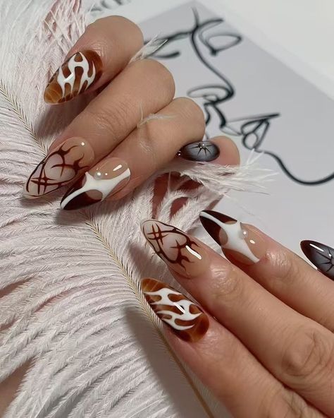 This press-on nail set features a brown gradient design, paired with abstract flame patterns and pearl accents. It‘s perfect for those looking to stand out in the fall season.🍂 #nailsofinstagram  #nails #dmvnails #nailsofinstagram #nailinspo #nailbusiness #naildesigns #rockvillenails #marylandnails #beautybyrachelbnails #gelx #gelxnails #dmvnailtech #dmvnails #nailcourses #1on1 #gelxclass #dmvgelxclas #lanailartist #apresgelx #apresnails Nail Courses, La Nails, Gradient Design, Brown Gradient, In The Fall, Nail Tech, Fall Season, Press On Nails, Nail Inspo