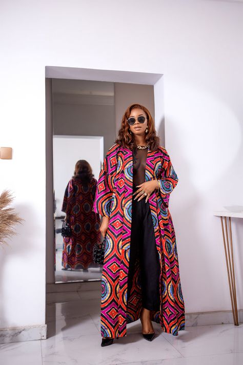 Our African prints will brighten your closet. We give you the best selections of African clothing online. Shop our African dresses, blouses, skirts etc now. Use coupon code "SHIPFREE" for free shipping in USA and Canada. Ankara Jackets For Women, African Print Jacket, Kimono Plus Size, African Print Kimono, Ankara Jackets, Hippie Jacket, Plus Size Kimono, Maxi Kimono, African Dresses Modern