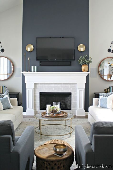 Dramatic Fireplace Transformation Dark Grey Chimney Wall, Dark Painted Fireplace Wall, Cyberspace Sherwin Williams Accent Walls, Navy Blue Fireplace, Gray Chimney, Navy Fireplace, Sw Cyberspace, Dramatic Fireplace, Fireplace Transformation