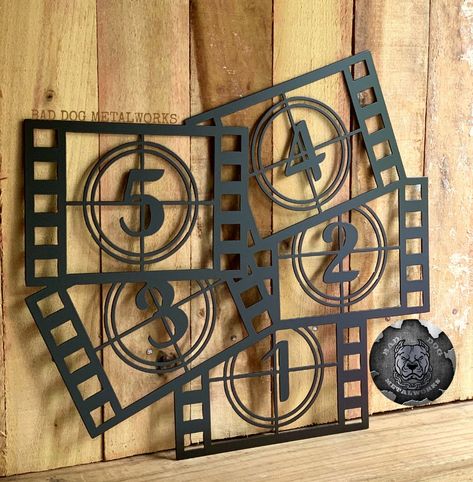 "5, 4, 3, 2, 1. ACTION! Our countdown collage screams unique home theater decor. Don't you agree? Bad Dog Metalworks \"Film Countdown Collage\" sign made from 16-gauge metal. Available in bare metal or a variety of powder coat finishes. ● SIZE: 18.2\" (w) x 16.3\" (h) ● QUALITY HOME DECOR: Craftsmanship is key in every piece! ● HANDCRAFTED ART: Veteran owned and Proudly made in the U.S.A. ● FREE SHIPPING: This item ships FREE to the continental United States.  Please note that our bare metal sig Film Countdown, Old Hollywood Decor, Hollywood Decor, Theater Room Decor, Movie Theater Decor, Cinema Sign, Cinema Decor, Film Club, Theater Decor