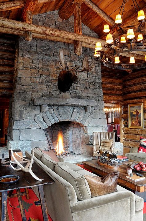 Cozy ski lodge retreat boasting rustic elegance in Big Sky Ski Lodge Living Room, Ski Lodge Fireplace, Lodge Fireplace, Cozy Ski Lodge, Lodge Living Room, Lodge Aesthetic, Winter Lodge, Cabin Fireplace, Lodge Design