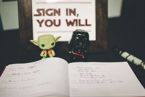 Having a guest book will be a wonderful tangible memory to bring home. The Yoda-approved sign adds that Star Wars touch. Starwars Wedding Ideas, Star Wars Guest Book, Wedding Star Wars, 70th Wedding Anniversary, Lego Wedding, Star Wars Wedding Theme, Star Wars Invitations, Nerd Wedding, Star Wars Figurines