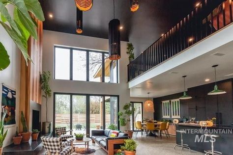 Luke Caldwell of HGTV's 'Boise Boys' Selling His $1.3M River House Boise Boys, Custom Garage Doors, Concrete Staircase, Parents Bedroom, Floating Staircase, Black Kitchen Cabinets, Modern Appliances, River House, Black Cabinets