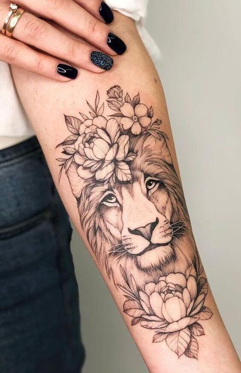 15+ Best Lion and Flowers Tattoo Designs | PetPress Lion Tattoo With Flowers, Female Lion Tattoo, Tato Lengan Bawah, 27 Tattoo, Tato Dengan Makna, Tato Jari, Bauch Tattoos, Lion Tattoos, Ring Finger Tattoos