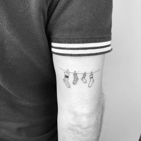 Socks Tattoo Ideas, Sock Tattoo Ideas, Family Tattoos Symbolic, Socks Tattoo, Sock Tattoo, Tattoo On The Back, Tricep Tattoos, Explore Tattoo, Baby Tattoos