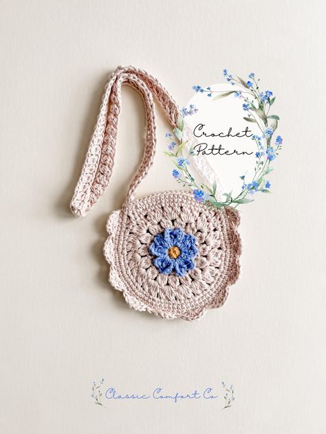 This listing is for the Maya Toddler Purse Crochet Pattern only, not the finished product.  The Maya Toddler Purse forget-me-not crochet pattern is designed to honor the people we could never forget. Whether they're here with us earth-side or they're waiting for us in Heaven, this pattern will bring a little bit of them to you (or you to them!).  It will make the perfect spring flower purse to add to your toddler's wardrobe! The Maya Toddler Purse pattern is written in standard US terminology. Crochet Kids Bag, Crochet Kids Purse, Crochet Flower Purse, Crochet Bag Purse, Purse Crochet Pattern, Crochet Pattern Flower, Art Au Crochet, Spring Toddler, Toddler Purse