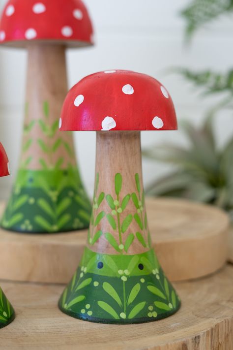 Three painted wooden mushrooms sprout from the ground. Arrange these pieces together or separately or group them with other fungi decor. These toadstools rule. Made in: India Brand: Kalalou Wooden Mushrooms Painted, Painted Wood Mushrooms, Fungi Decor, Painted Wooden Mushrooms, Peg Crafts, Painted Mushrooms, Wooden Mushrooms, Mushroom Paint, Mushroom Crafts