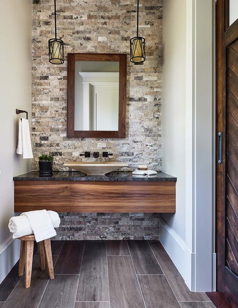 Natural elements of stone and wood are features consistent throughout the home - even the bathroom. Mountain Bathroom, Stone Accent Walls, Bathroom Accent Wall, Bathroom Accents, Stone Bathroom, Raleigh North Carolina, Rustic Bathrooms, Custom Built Homes, Wood Bathroom