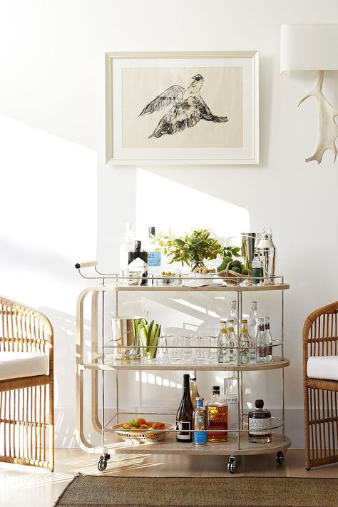 Is it happy hour yet? Made of bleached wood and a leather wrapped handle, the bar cart looks at home in town and country. Shop the Brays Bar Cart designed by Beth Webb for Arteriors at 2Modern. African Chair, Bar Cart Inspo, Beth Webb, Bar Cart Design, Wood Bar Cart, Modern Bar Cart, Vintage Bar Carts, Bar Cart Styling, Bleached Wood