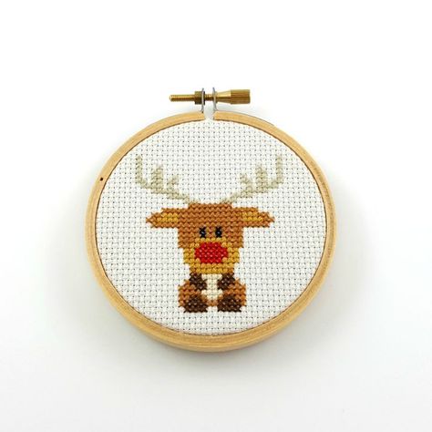 rudolph the red nosed reindeer cross stitch pattern #xmas #rudolphtherednosedreindeer #reinder #christmas Christmas Cross Stitch Patterns Free, Xmas Cross Stitch, Winter Cross Stitch, Cross Stitch Christmas Ornaments, Cross Stitch Tree, Animal Cross Stitch Patterns, Embroidery Christmas, Diy Cross, Mini Cross Stitch