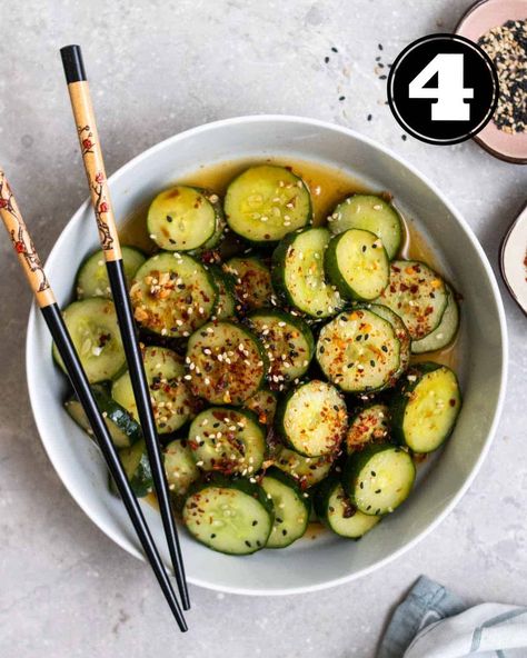 Refreshing, crunchy, and flavorful with a nice kick, this spicy Asian cucumber salad is the perfect side dish for the warmer weather! This amazing recipe is super easy to make and ready in 20 minutes. Spicy Asian Cucumber Salad, Chinese Cucumber Salad, Asian Cucumber Salad Recipe, Chinese Cucumber, Spicy Cucumber Salad, Asian Cucumber Salad, Favorite Salad, Vegan Asian, Cucumber Recipes Salad