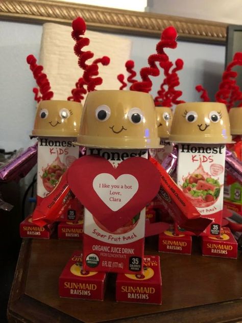 Valentine bots for daycare. Use applesauce cups, juice box, raisin boxes, and small candy. Valentines Robot Snacks, Valentine’s Day Juice Boxes, Valentines Juice Box Ideas, Valentine Robot Juice Boxes, Valentine Daycare Gifts, Prepackaged Valentine Snacks For School, Valentines Juice Box Ideas For Kids, Valentine Snacks For Kids School, Valentine Snack Ideas For Kids Classroom