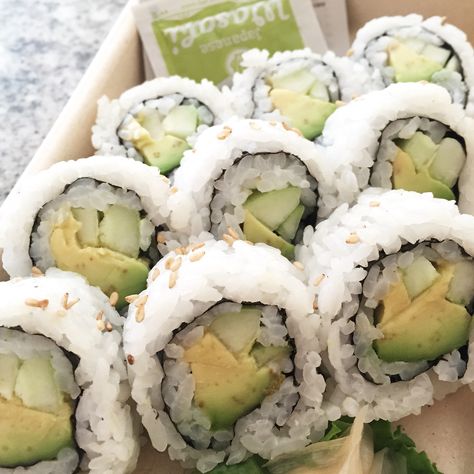 Sushi on sushi. Avocado + cucumber roll Avocado Sushi, Cucumber Rolls, Avocado Cucumber, Cucumber Avocado, Sushi Roll, Sushi Rolls, Cucumber, Avocado, Rolls