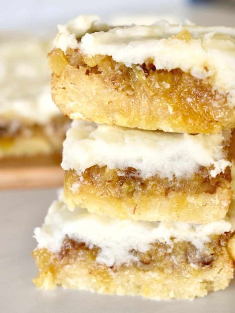 Pineapple Bars are the BEST recipe with a shortbread base, pineapple filling, and easy pineapple icing on top. Don't miss this delicious recipe for pineapple squares full of tropical flavor. #pineapplebar #pineapplesquare Pineapple Squares Old Fashion, Pineapple Icing, Pineapple Bars, Pineapple Squares, Pineapple Filling, Cooked Pineapple, Christmas Cookie Bars, Cookies Bars, Best Recipe